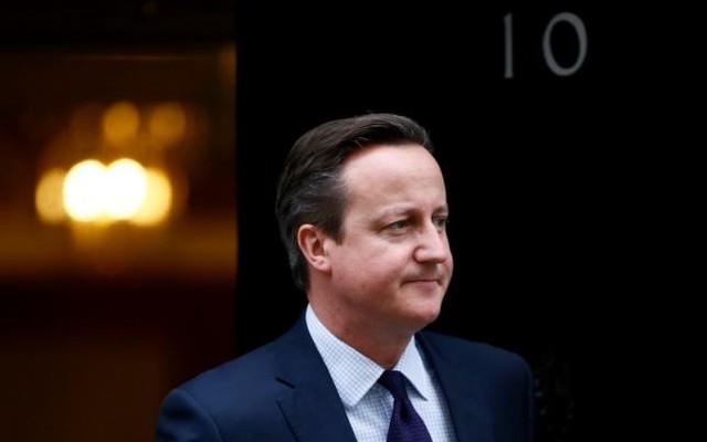 Britain's Prime Minister David Cameron waits to greet his Slovenian counterpart Miro Cerar at Number 10 Downing Street in London Britain