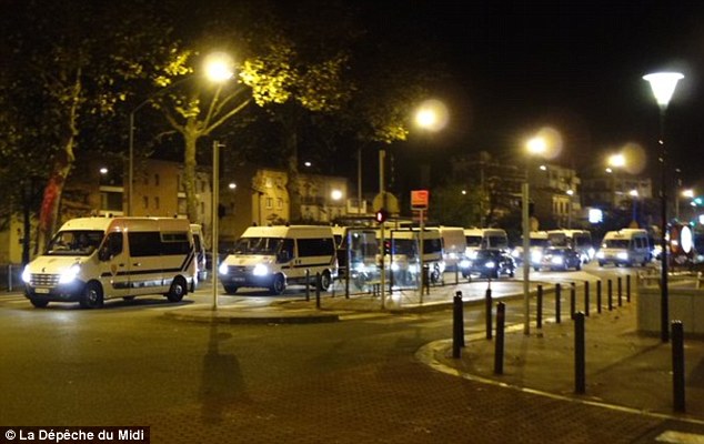 French anti-terror police are carrying out a series of coordinated dawn raids on a number of addresses in Toulouse Grenoble Calais and a Paris suburb