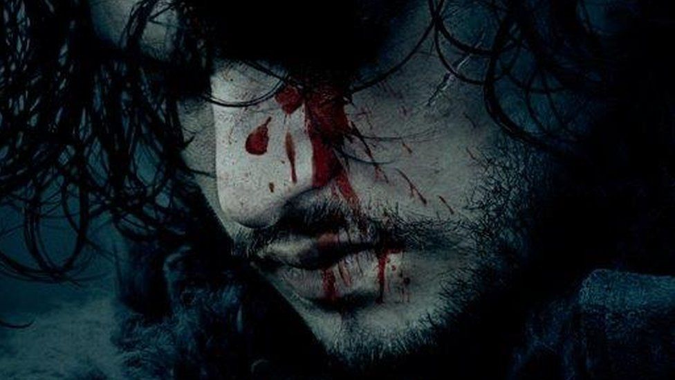 The character of Jon Snow with bloody on his face