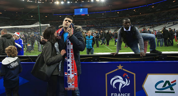 Fans stay calm amid chilling atmosphere at Stade de France