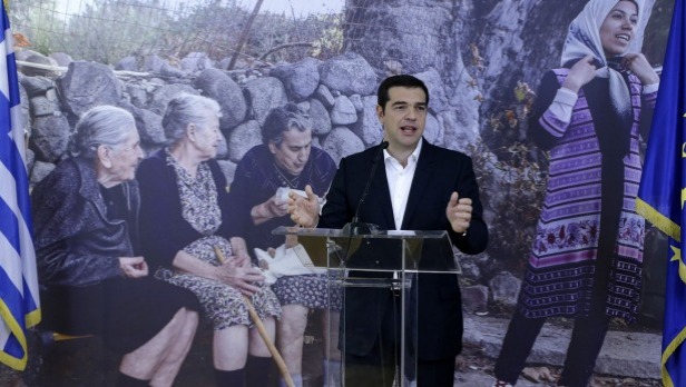 Greece's Prime Minister Alexis Tsipras announces that the first 30 refugees to be relocated from Greece have boarded a plane for Luxembourg