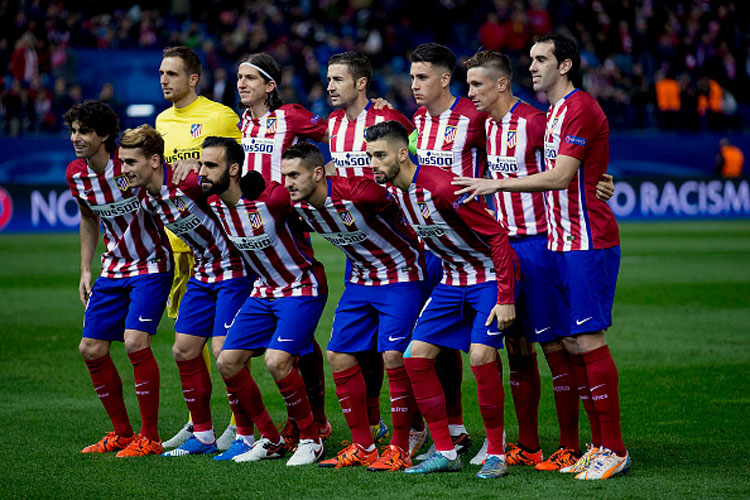 Atletico Madrid eased through to the Champions League round of 16 with a game to spare and eliminated Galatasaray when Antoine Griezmann's double secured a 2-0 win at home to the Turkish side in Group C on Wednesday