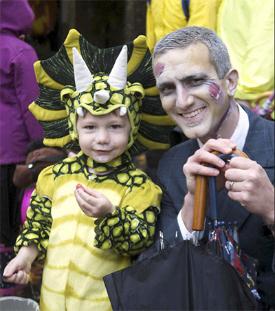 Zombie Ian Eisenhood celebrates Oct. 31 with his son during downtown Bainbridge Island’s 2012 Halloween on Winslow Way.- File