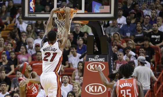 Hassan Whiteside dunks against the Houston Rockets in the first half of an NBA basketball game Sunday Nov. 1 2015 in Miami