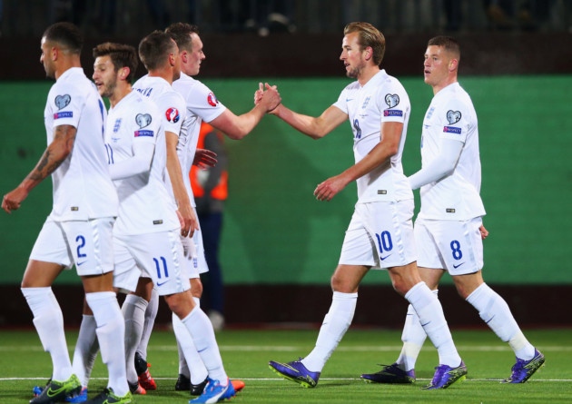 Harry Kane of England celebrates with Phil Jones for England