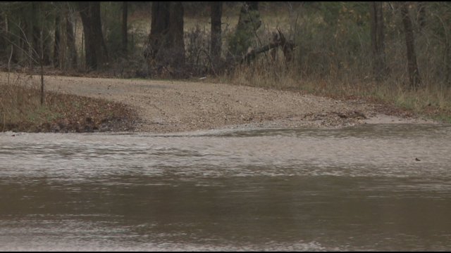 Johnson County authorities have recovered the body of a woman who was swept away in swift water early Friday morning