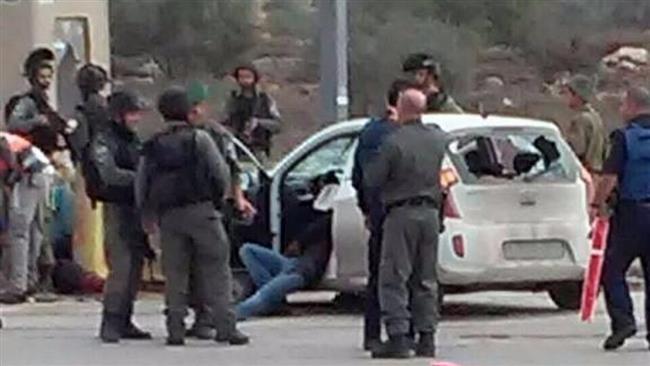 Israeli forces gather in the area where an alleged Palestinian hit-and-run attack was carried out near the occupied West Bank city of Nablus