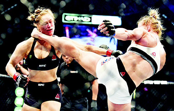 Holm dethrones Rousey as UFC champ