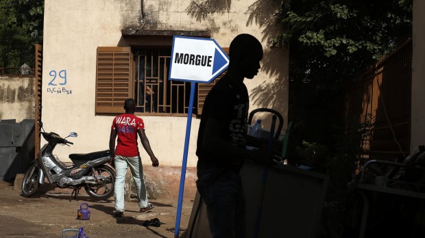 Hospital staff outside the morgue of the Gabriel Toure hospital in Bamako Mali on Sunday