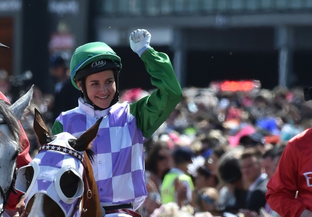 Jockey Michelle Payne celebrates on Prince of Penzance at Flemington Racecourse