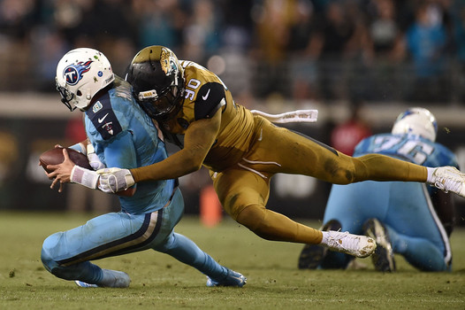 Andre Branch sacks Titans quarterback Marcus Mariota on the final play of Jacksonville's 19-13 win over the Tennessee Titans