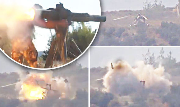 Footage appears to show Syrian rebels blowing up a Russian helicopter