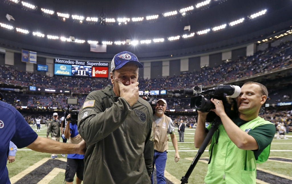 Tennessee Titans interim head coach Mike Mularkey reacts as he walks off the field after their overtime victory over the New Orleans Saints in an NFL football game in New Orleans Sunday Nov. 8 2015. The Titans won 34-28