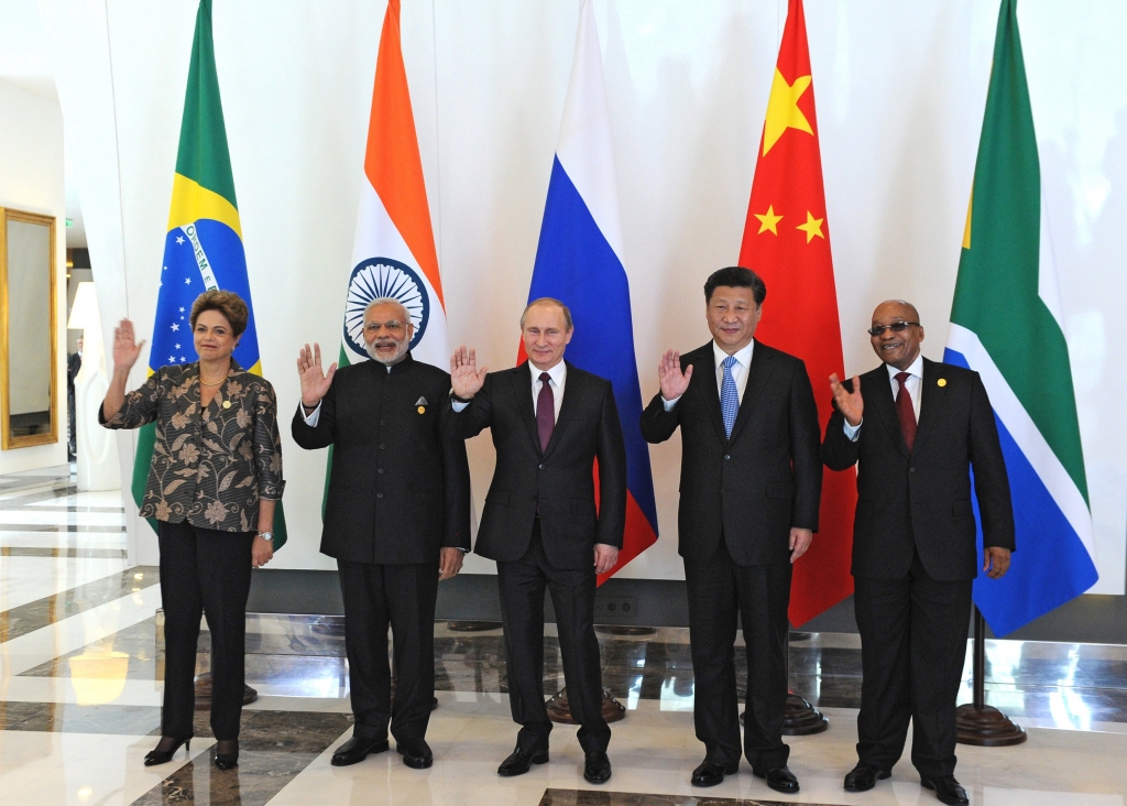 Brazil's President Dilma Rousseff Indian Prime Minister Narendra Modi Russian President Vladimir Putin Chinese President Xi Jinping and South African President Jacob Zuma pose during a family