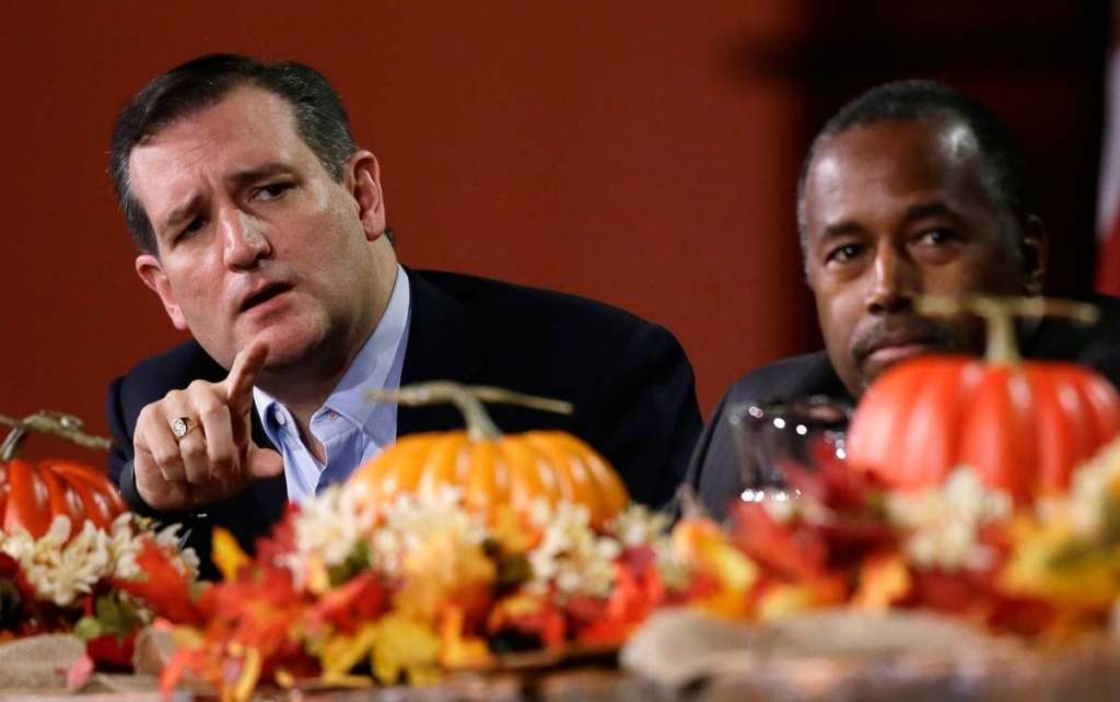 Republican presidential candidate Sen. Ted Cruz R-Texas left speaks during the Presidential Family Forum as Ben Carson listens Friday Nov. 20 2015 in Des Moines Iowa