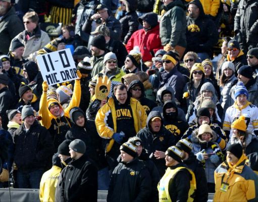 Iowa fans cheer during the first half