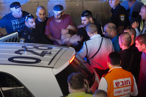 Israeli police arrest a Palestinian identified as Raed Khalil bin Mahmoud a 36-year-old from the West Bank village of Dura in Tel Aviv Israel Nov. 19 2015