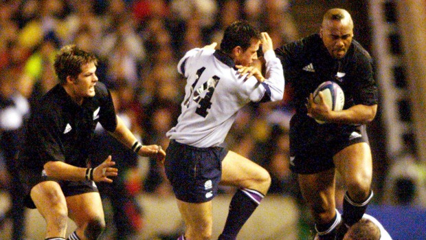 A young Richie Mc Caw in the black jersey alongside All Blacks legend Jonah Lomu in a test against Scotland in 2001