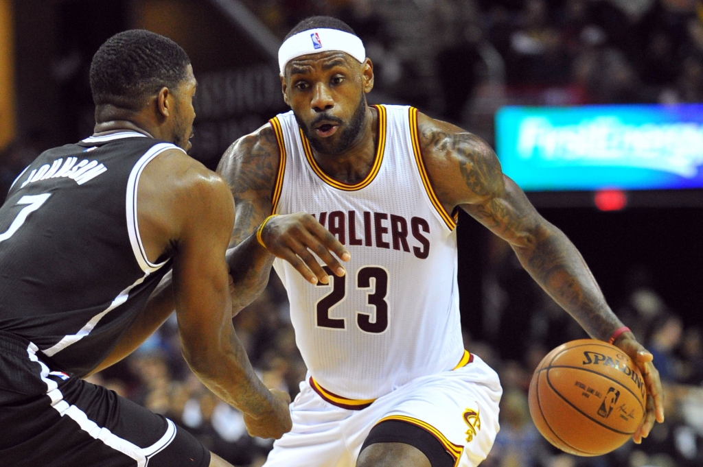 Nov 28 2015 Cleveland OH USA Cleveland Cavaliers forward Le Bron James works against Brooklyn Nets forward Joe Johnson during the second quarter at Quicken Loans Arena. Mandatory Credit Ken Blaze-USA TODAY Sports