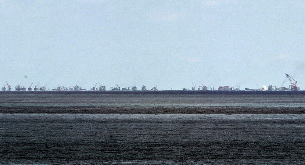 The alleged on-going reclamation of Subi Reef by China is seen from Pag-asa Island in the Spratly Islands in the South China Sea western Palawan Province Philippines Monday