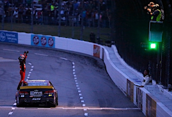 Jeff Gordon takes a bow after earning a victory and a berth in the four-driver final round of the Chase for the Sprint Cup playoffs on Sunday