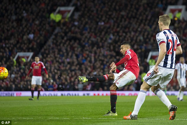 Jesse Lingard bends in his first goal for Manchester United during the 2-0 win over West Brom at Old Trafford