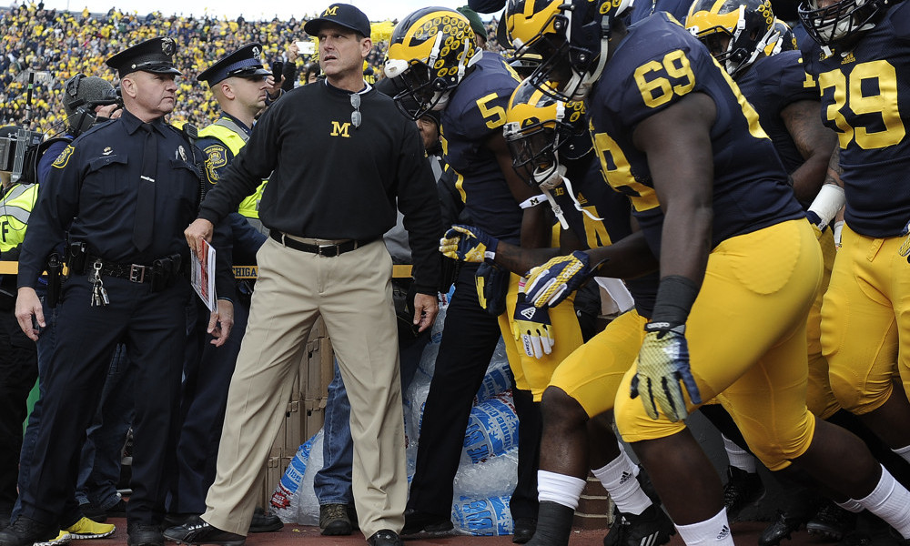 Jim Harbaugh crushed a buckeye with a hammer on Bo Schembechler's grave