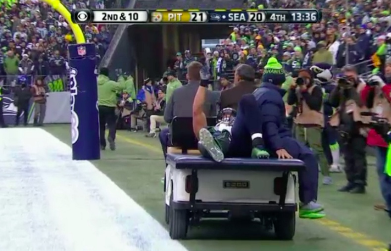 Jimmy Graham is carted off the field