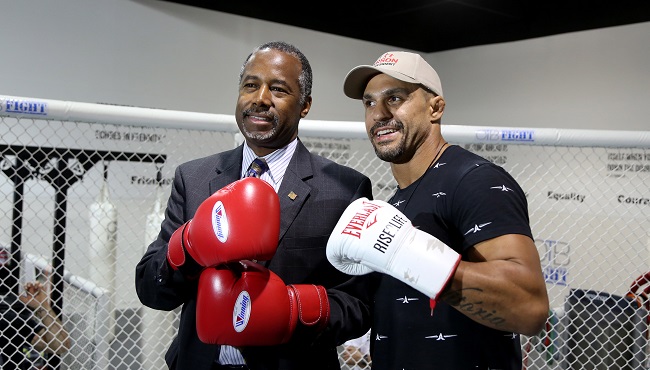 UFC middleweight fighter Vitor Belfort poses with presidential candidate Ben Carson at the OTB Fight gym in Coconut Creek Fla. Belfort is endorsing Carson.  MAGS OUT