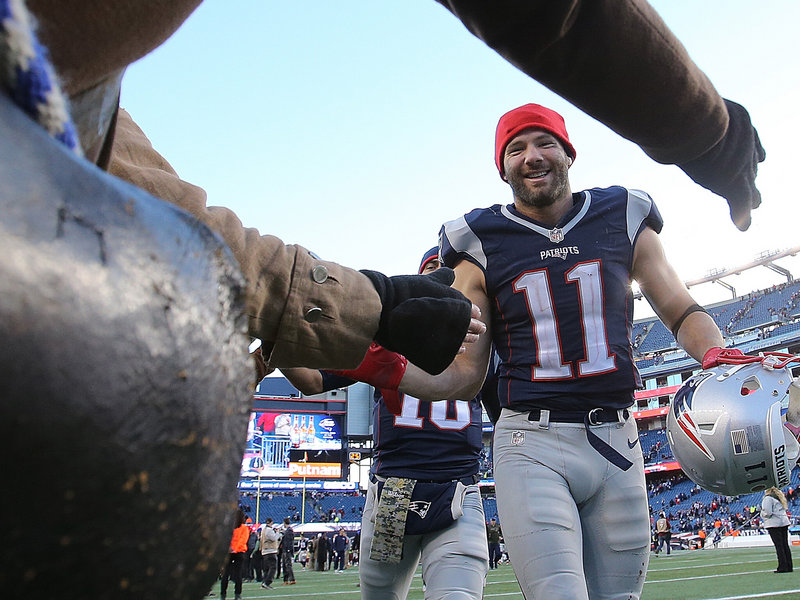 Julian Edelman #11 of the New England Patriots celebrates a win over the Washington Redskins