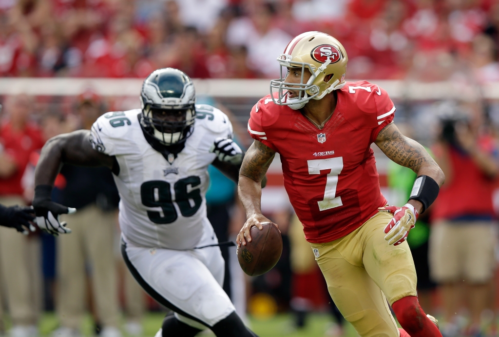 SANTA CLARA CA- SEPTEMBER 28 Colin Kaepernick #7 of the San Francisco 49ers is pressured by Bennie Logan #96 of the Philadelphia Eagles at Levi's Stadium