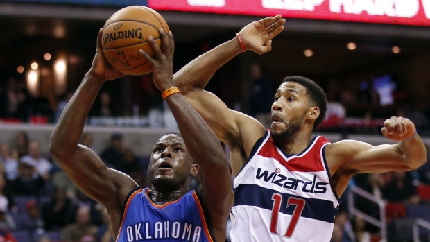 Dion Waiters fends off Garrett Temple