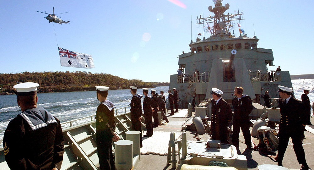 Sailors stand aboard Australia's HMAS Stuart on Friday Sept. 10 2004