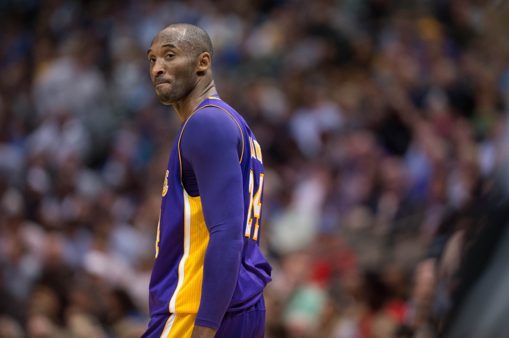 Nov 13 2015 Dallas TX USA Los Angeles Lakers forward Kobe Bryant smiles to the crowd during the second half against the Dallas Mavericks at the American Airlines Center. The Mavericks defeat the Lakers 90-82. Mandatory Credit Jerome Miron-USA T