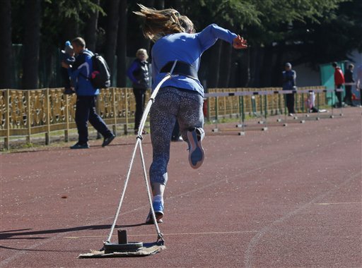 Olga Kharitonova 100 and 200-meter runner national olympic team candidate works-out during a training session at the Yunost sports ground at the Black Sea resort of Sochi Russia Thursday Nov. 12 2015. Facing allegations that Russia engages