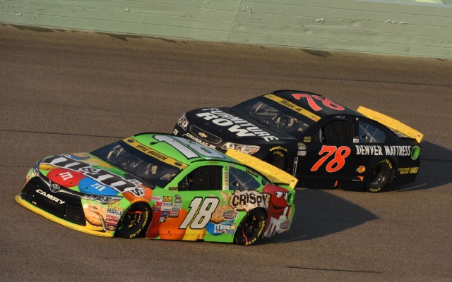 Kyle Busch and Martin Truex Jr. run near the front