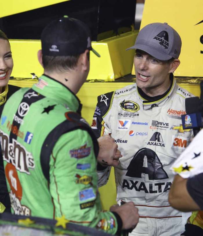 Jeff Gordon congratulates Kyle Busch after Busch won the race and the season title on Sunday in Homestead. It was the final race of Gordon's career. He won 93 Cup races during his 23 years as a driver. David Graham  Associated Press