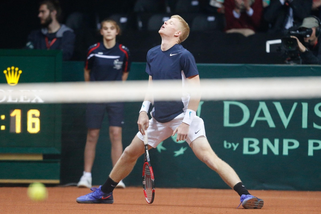 Kyle Edmund in action against Belgium's David Goffin during the first match of the Davis Cup final in Ghent