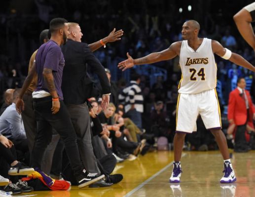 Los Angeles Lakers forward Kobe Bryant right celebrates