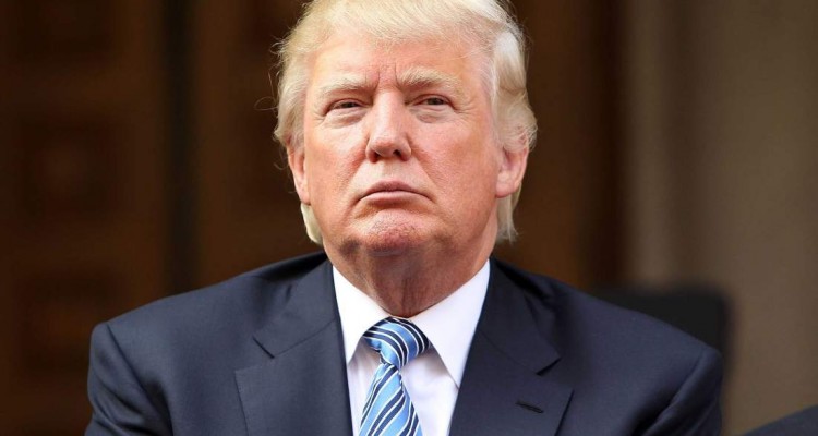 WASHINGTON DC- JULY 23 Donald Trump listens at the Trump International Hotel Washington D.C Groundbreaking Ceremony at Old Post Office