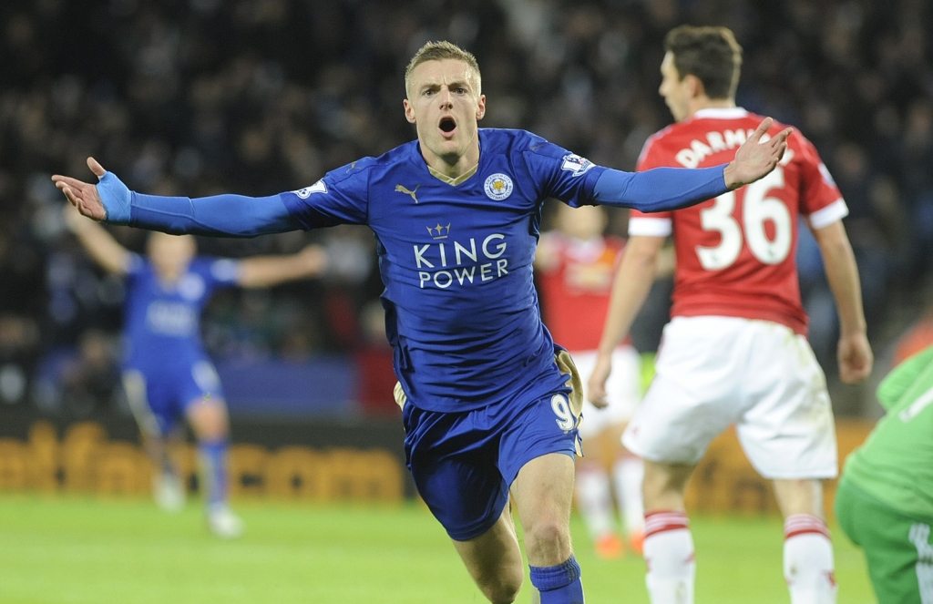 Vardy breaks scoring record as Leicester hold United