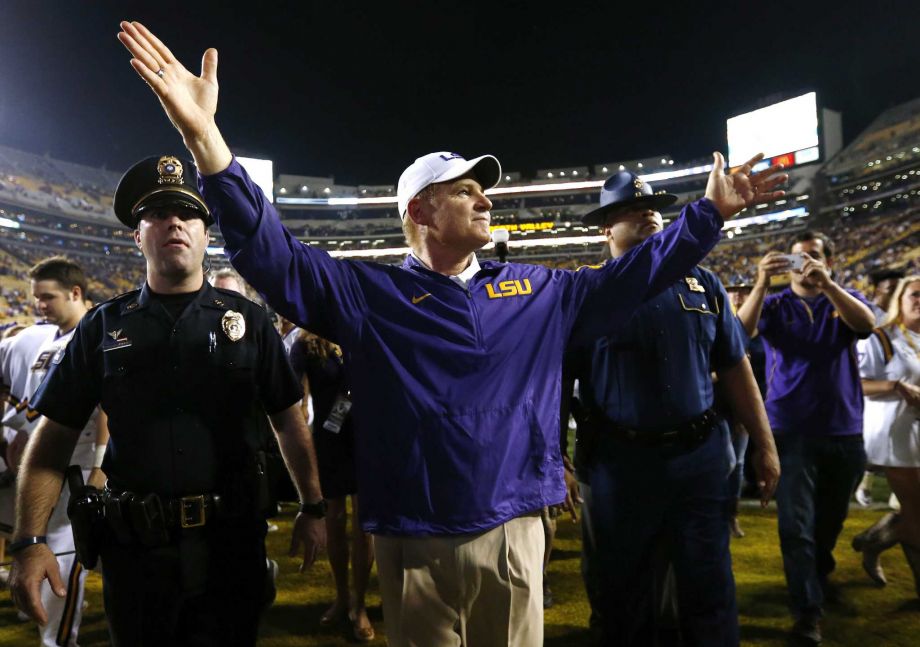 LSU head coach Les Miles celebrates after an NCAA college football game against Texas A&M in Baton Rouge La. Saturday Nov. 28 2015. LSU won 19-7