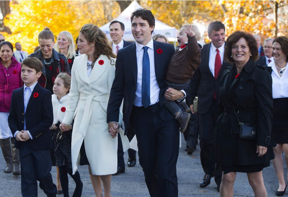 Justin Trudeau his wife children and mother walk to a swearing-in ceremony in Ottawa