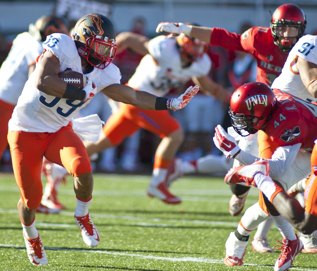 Oct 31 2015 Las Vegas NV USA Boise Broncos running back Kelsey Young runs the ball against UNLV Rebels defensive back Kenny Keys during a game at Sam Boyd Stadium. The Broncos won the game 55-27. Mandatory Credit Stephen R. Sylvanie-USA TO