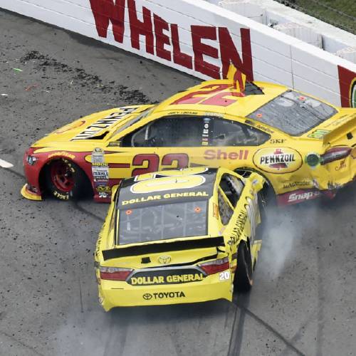 Joey Logano and Matt Kenseth tangle in Turn 1 during the NASCAR Sprint Cup Series auto race at Martinsville Speedway in Martinsville Va. It's the wild west in NASCAR right now and it's