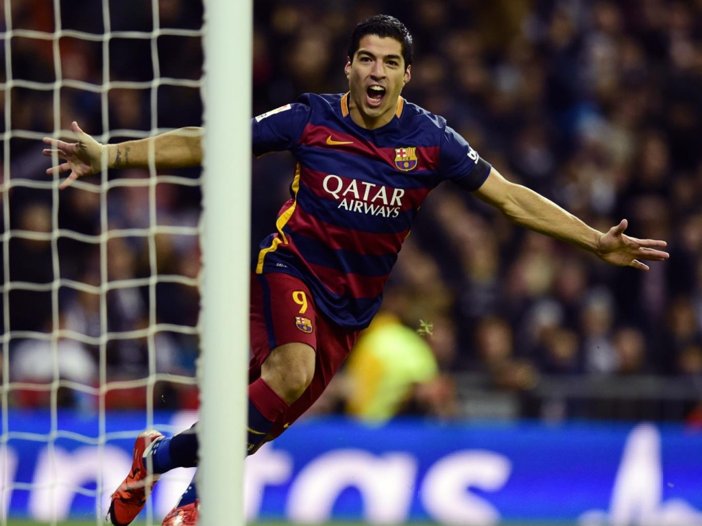 Luis Suarez celebrates opening the scoring Getty Images