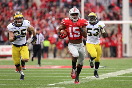 Then sophomore running back Ezekiel Elliott carries the ball during a game against Michigan on Nov. 29 at Ohio Stadium. OSU won 42-28. Credit Lantern File