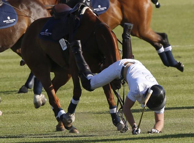 Prince Harry takes a tumble during the Sentebale Royal Salute Polo Cup in Paarl South Africa on Saturday