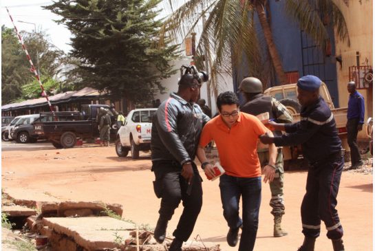 A hostage flees the Radisson Blu hotel in Mali after it was attacked by Al Qaeda militants. The attack may have been an attempt to assert the group's relevance as it faces an unprecedented challenge from the Islamic State group for leadership of the globa