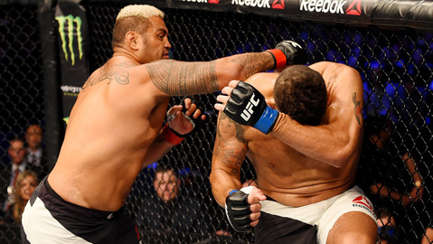 Mark Hunt lands a right-handed punch against Antonio Silva in their UFC heavyweight bout